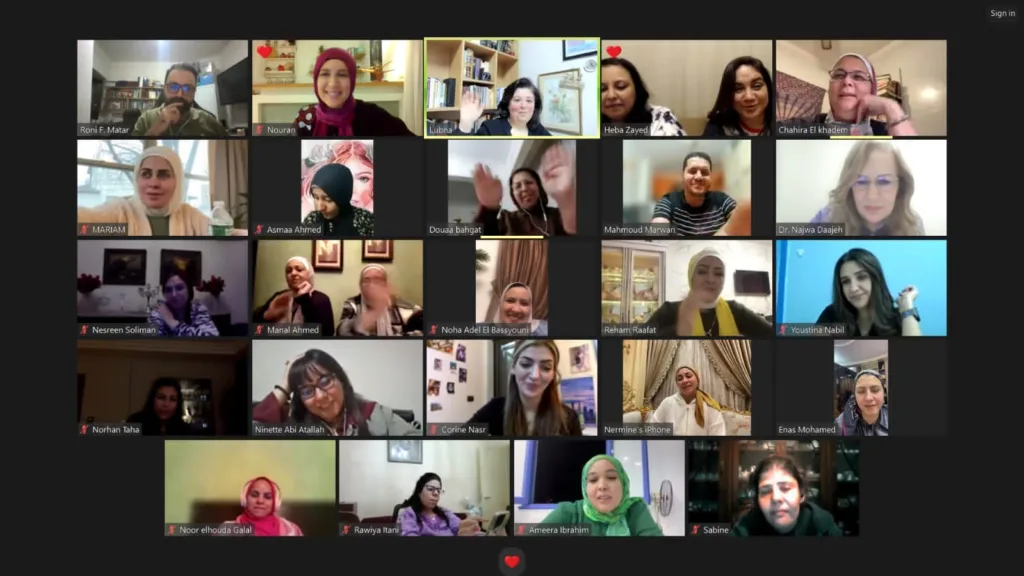 Screenshot of a virtual meeting on Zoom with over 20 women, many smiling, chatting, or clapping as they discuss EMDR and...